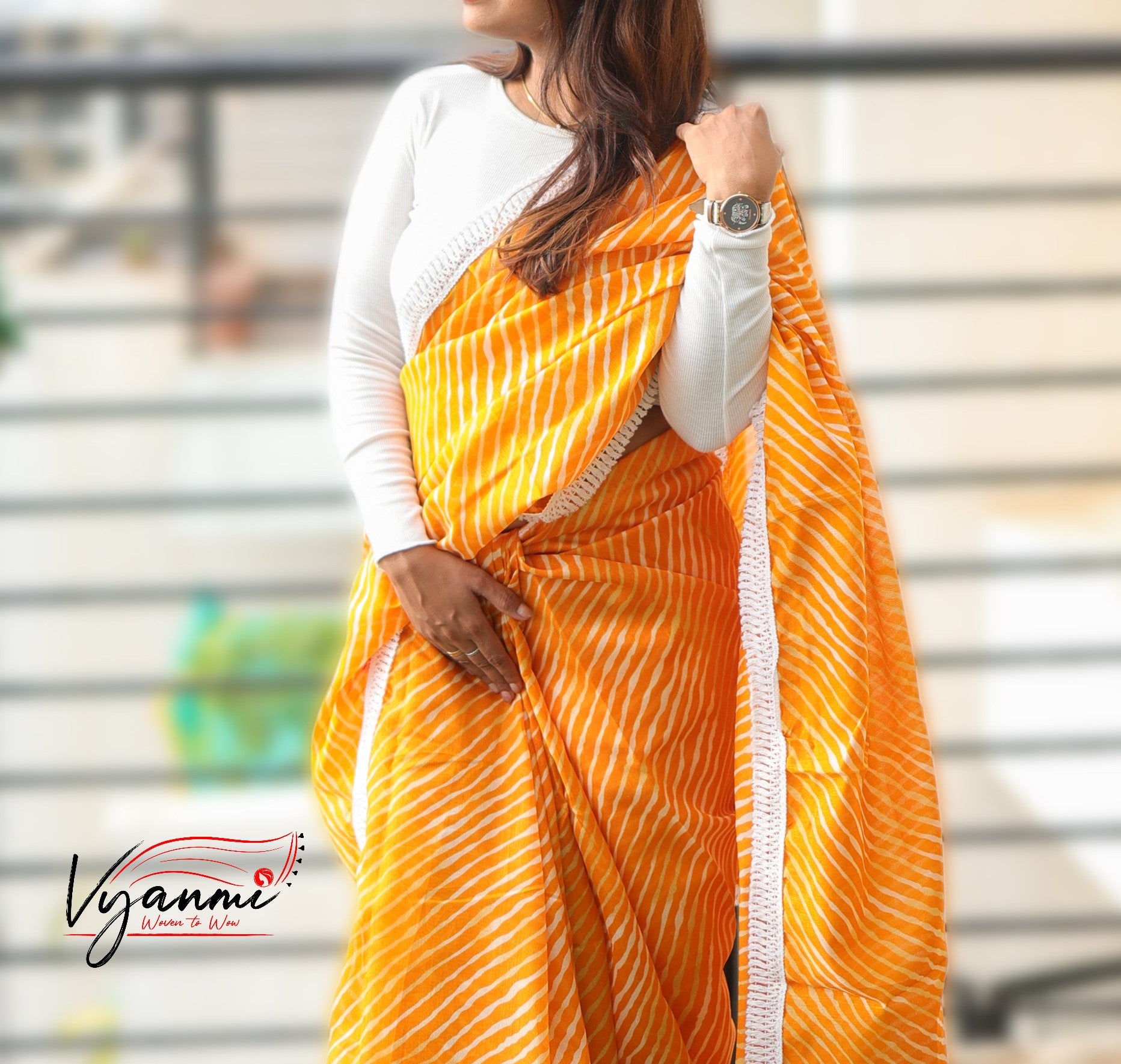 Vyanmi Orange Leher Linen Saree